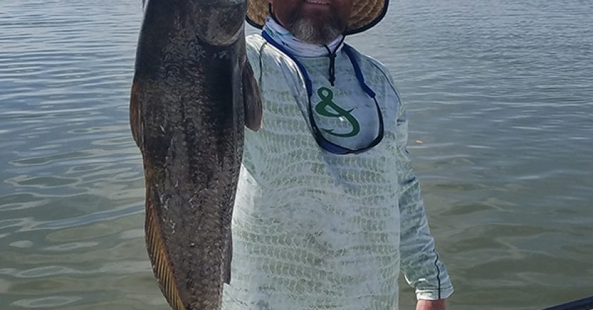 Landon Wells with a 17 lb 34 inch black drum caught in the Banana River in Cocoa