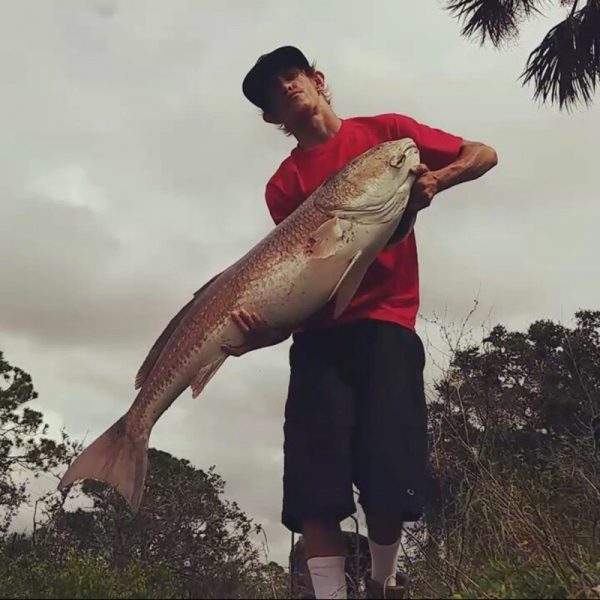 Mikey Argryoudis with his personal best a 47 inch redfish caught near Pine Island FL