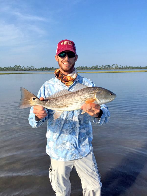 Chris Rushing caught this redfish sight-fishing in the skinny water of Goose Bayou.
