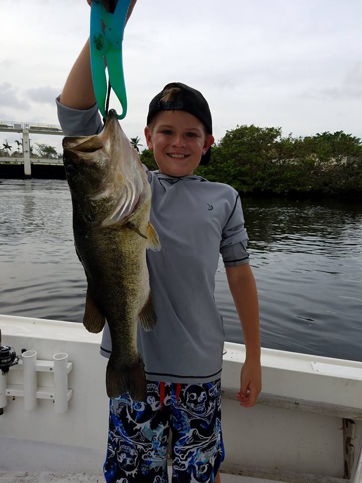TJ Van Sant caught this 24 inch bass on a topwater plug on saltwater side  of C 15 canal. Released back to fresh water side - Coastal Angler & The  Angler Magazine