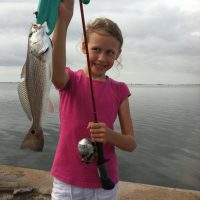 Madison Ellis with her first redfish