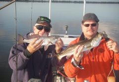 Bob and Mark had a great time catching spotted seatrout and redfish on a recent trip with Capt. Mark Wright