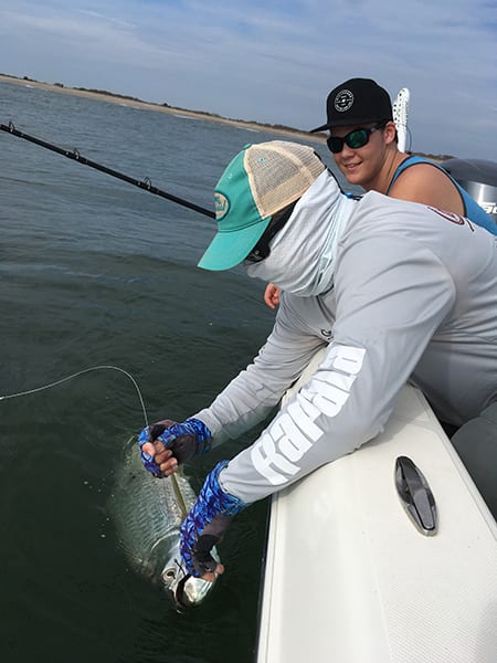 Tarpon can be found feeding on pogies and croakers just outside the surf break on most days.