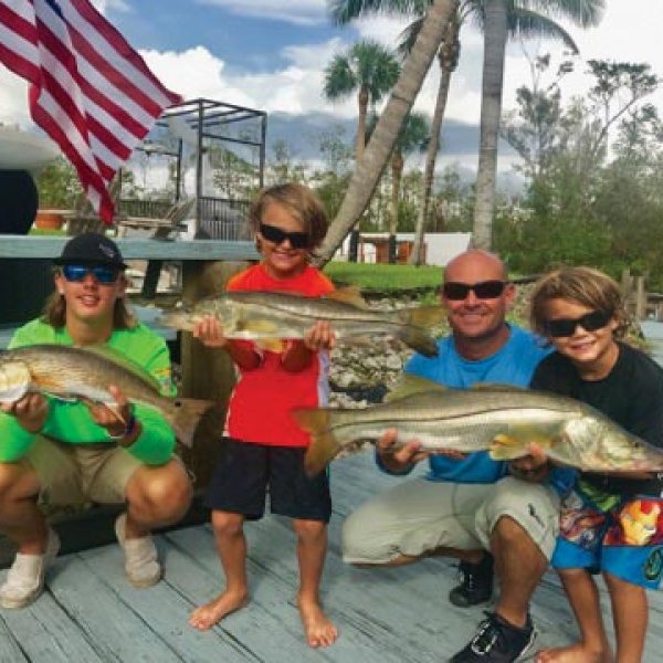 Kingston and Carson with their first keeper snooks caught on Capt. Redfish Rob’s Charters in Naples, FL