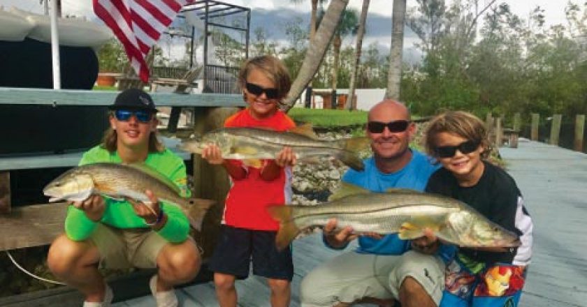 Kingston and Carson with their first keeper snooks caught on Capt. Redfish Rob’s Charters in Naples, FL