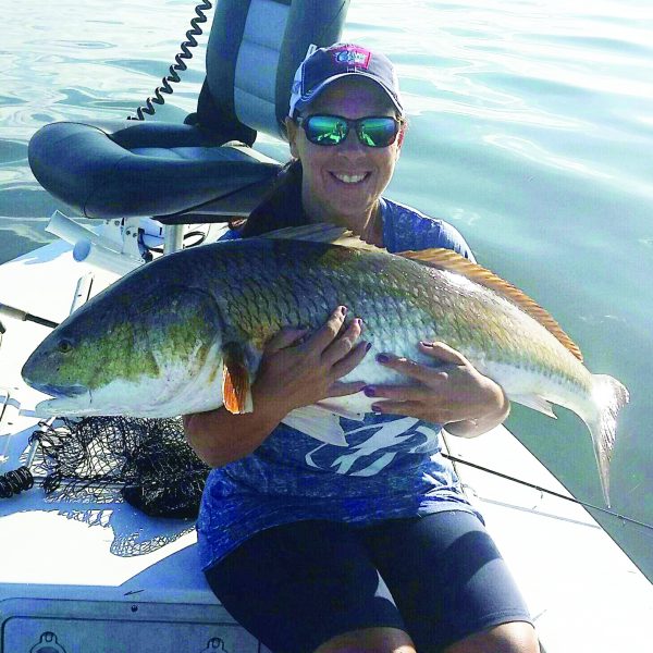 This is a 45" Red Drum caught by Denise Rolon on a Finger Mullet near Bio Lab. He was quickly released after this photo.