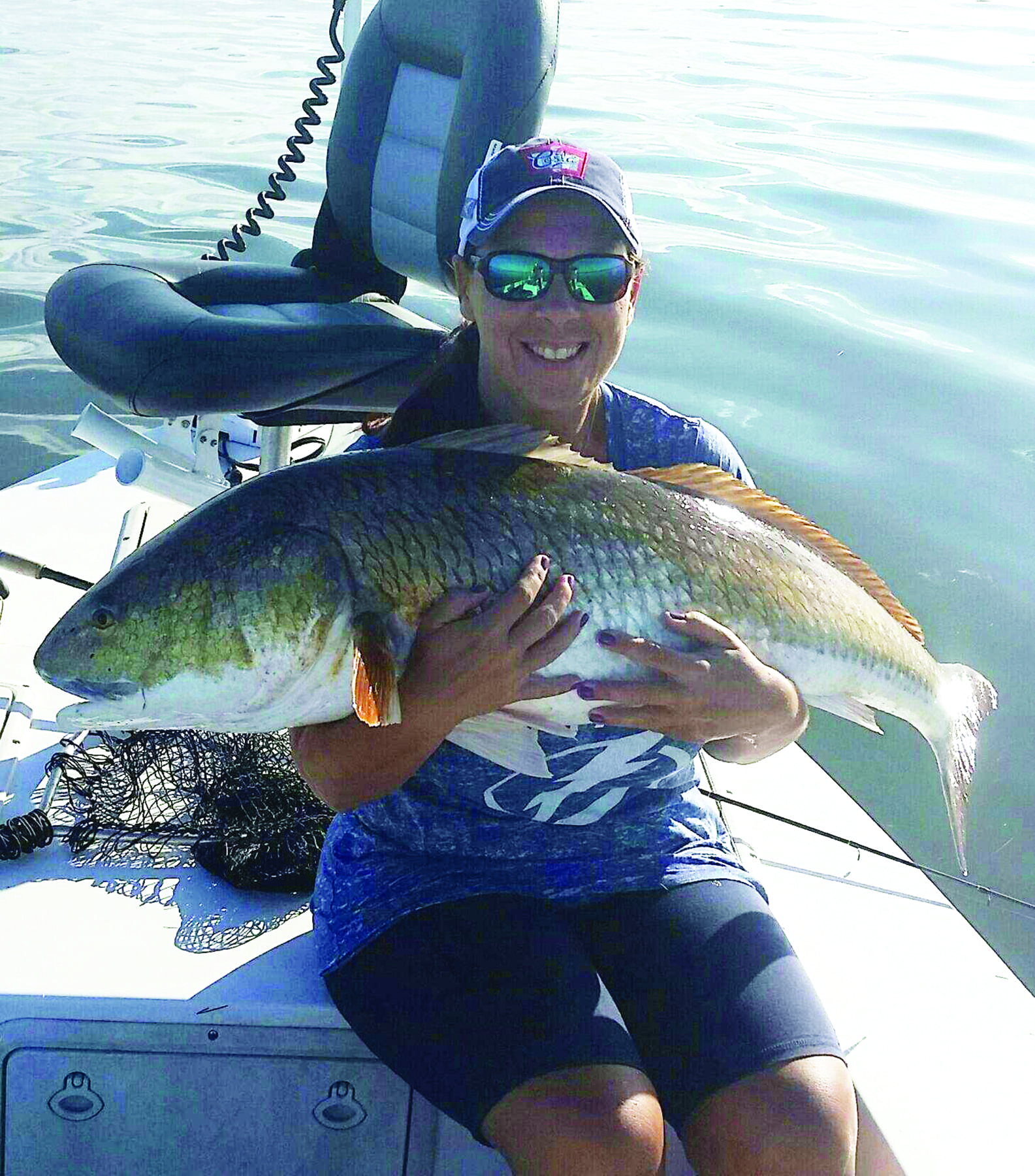 This is a 45" Red Drum caught by Denise Rolon on a Finger Mullet near Bio Lab.  He was quickly released after this photo.