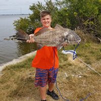Brett Jenkins (12 yrs old) with this MONSTER Black Drum- His 1st ever!