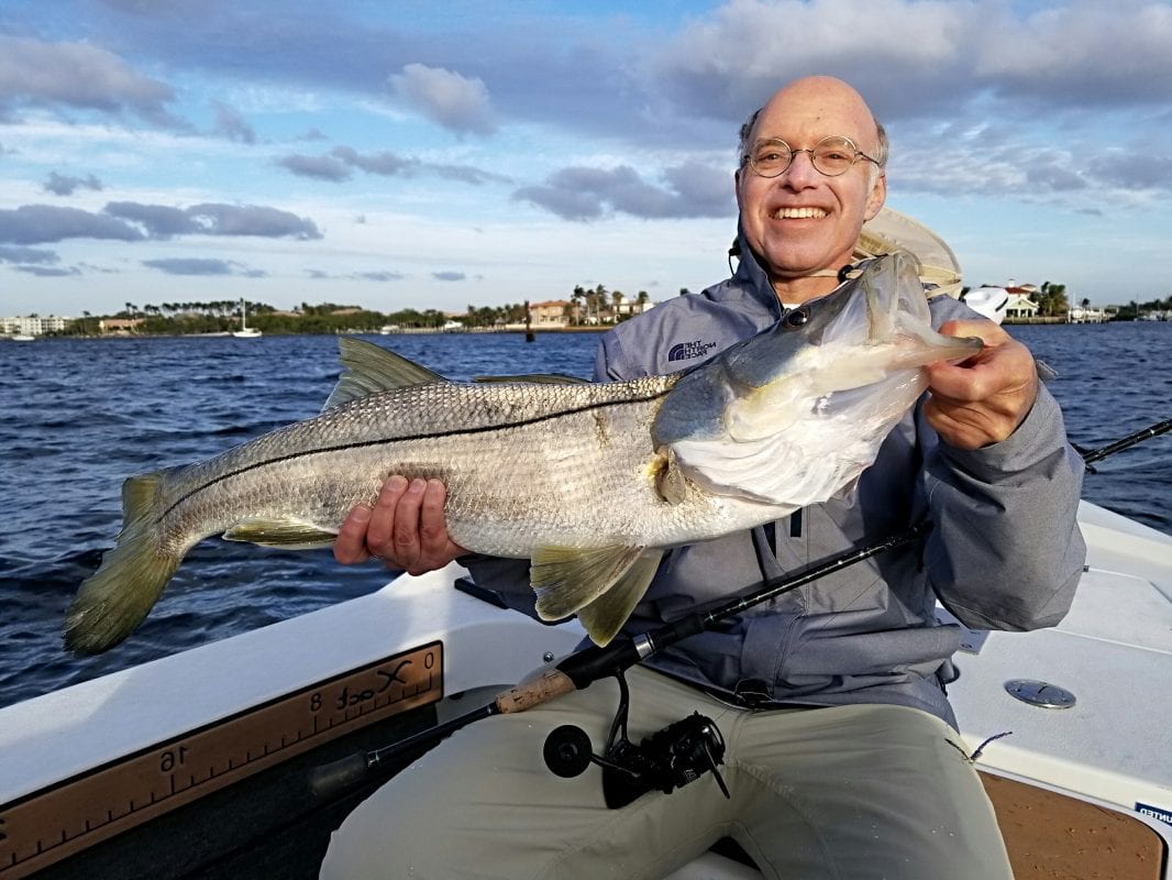 Dan Calder with a beautiful snook caught on a IDA cal jig Photo courtesy Swamp to Sea Coastal