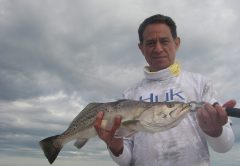 Tony enjoyed some early morning top-water action on a recent trip with Capt. Mark Wright.