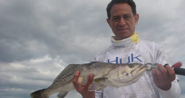 Tony enjoyed some early morning top-water action on a recent trip with Capt. Mark Wright.