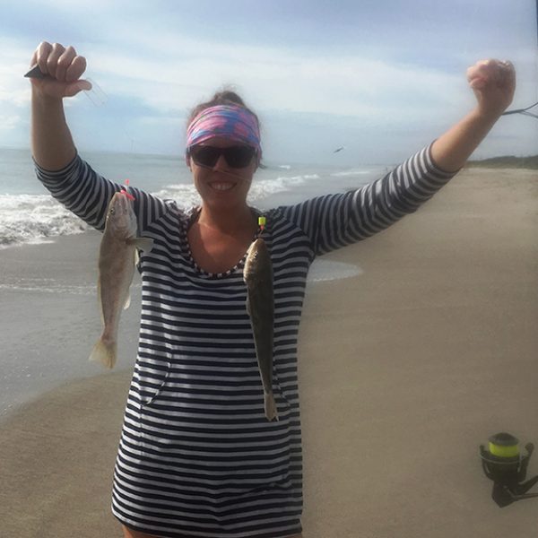 Happy lady angler catching two whiting at a time on the South Beaches.