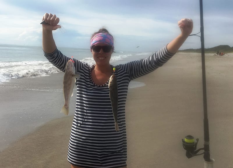 Happy lady angler catching two whiting at a time on the South Beaches.