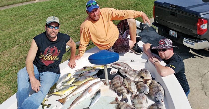Roy, Chappy & Geno from IN with a nice haul of sheepshead, pompano, reds & Spanish out of the bay aboard C-note Charters.