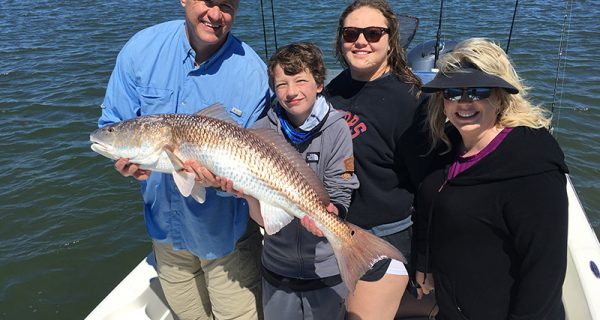 Redfish like this one caught by Greg Spurling and family used to be common catches in the Banana River Lagoon, but constant lawn fertilization and raw sewage dumping is killing this unique body of water.