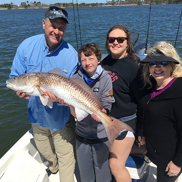 Redfish like this one caught by Greg Spurling and family used to be common catches in the Banana River Lagoon, but constant lawn fertilization and raw sewage dumping is killing this unique body of water.