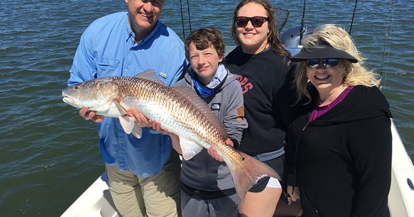 Redfish like this one caught by Greg Spurling and family used to be common catches in the Banana River Lagoon, but constant lawn fertilization and raw sewage dumping is killing this unique body of water.