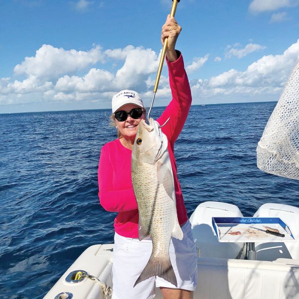 Sally Stribling slayed a slob of a mangrove snapper drifting a live ballyhoo off Key Largo.