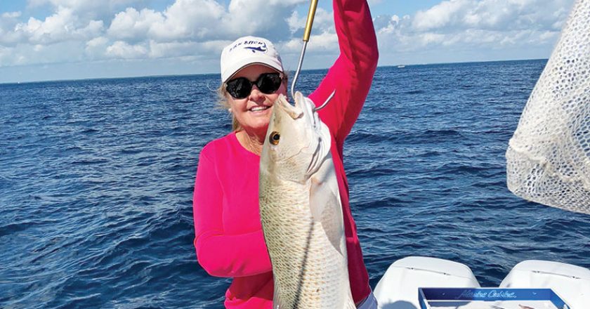 Sally Stribling slayed a slob of a mangrove snapper drifting a live ballyhoo off Key Largo.