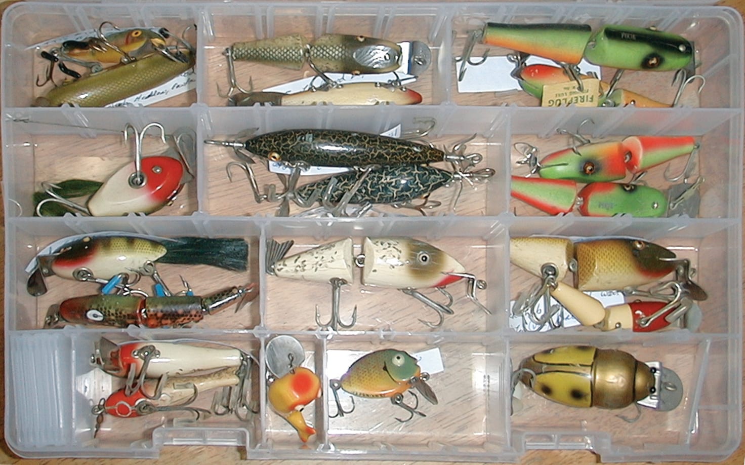 Vintage fishing tackle box with lots of lures and flies. 7d - Lil Dusty  Online Auctions - All Estate Services, LLC