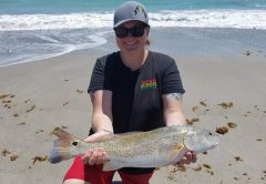 Shannon Cole caught this 23 1\2 inch beautiful Redfish awesome coloring on the tail! She's just getting into fishing and she's hooked!