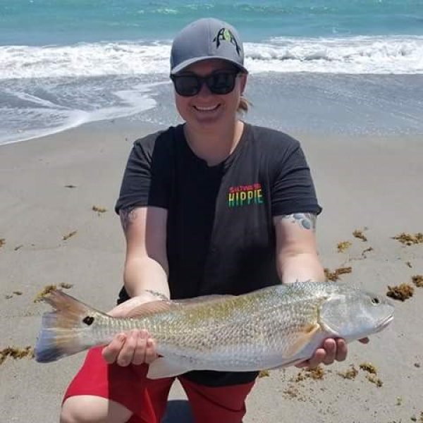 Shannon Cole caught this 23 1\2 inch beautiful Redfish awesome coloring on the tail! She's just getting into fishing and she's hooked!