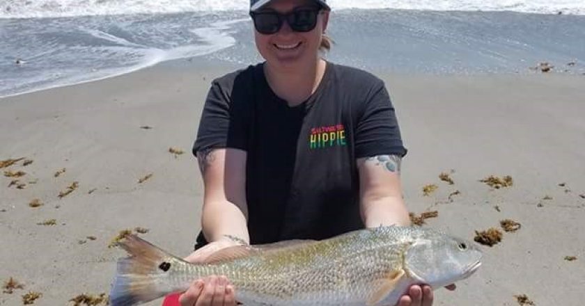 Shannon Cole caught this 23 1\2 inch beautiful Redfish awesome coloring on the tail! She's just getting into fishing and she's hooked!