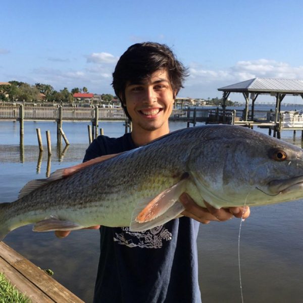 Alex with a nice red caught on the flats on the east side of the Indian river between the Eau Gallie and Melbourne causeways.