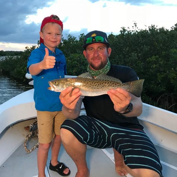 Bryson of Smacked TV with a Nice Trout while fishing with the Native Eyewear Team & Yellow Dawg Fishing