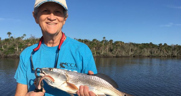 Debbie Smith’s redfish hit a Saltwater Assassin 4-inch sea shad in the Natural glow color.