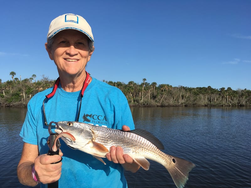 Debbie Smith’s redfish hit a Saltwater Assassin 4-inch sea shad in the Natural glow color.