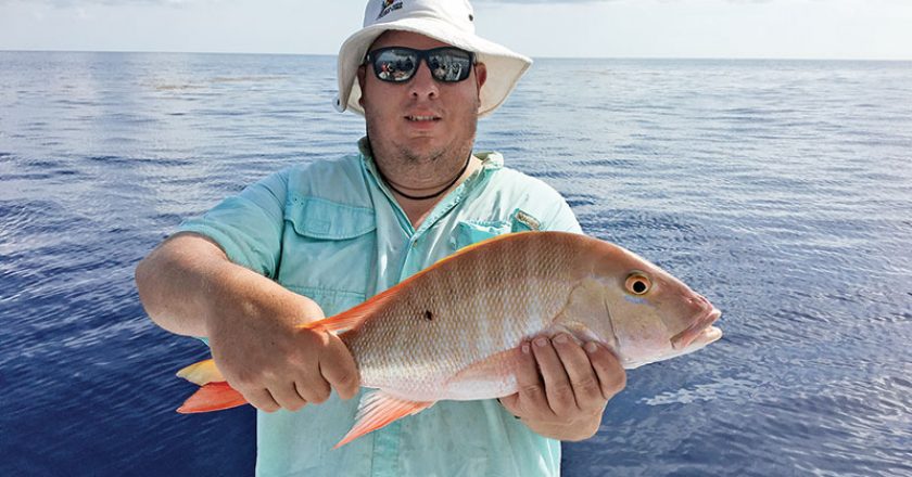 Glen with a nice mutton snapper caught with Fishing Headquarters.
