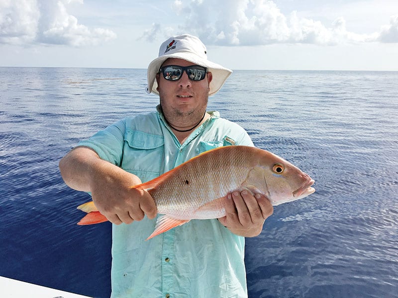 Glen with a nice mutton snapper caught with Fishing Headquarters.