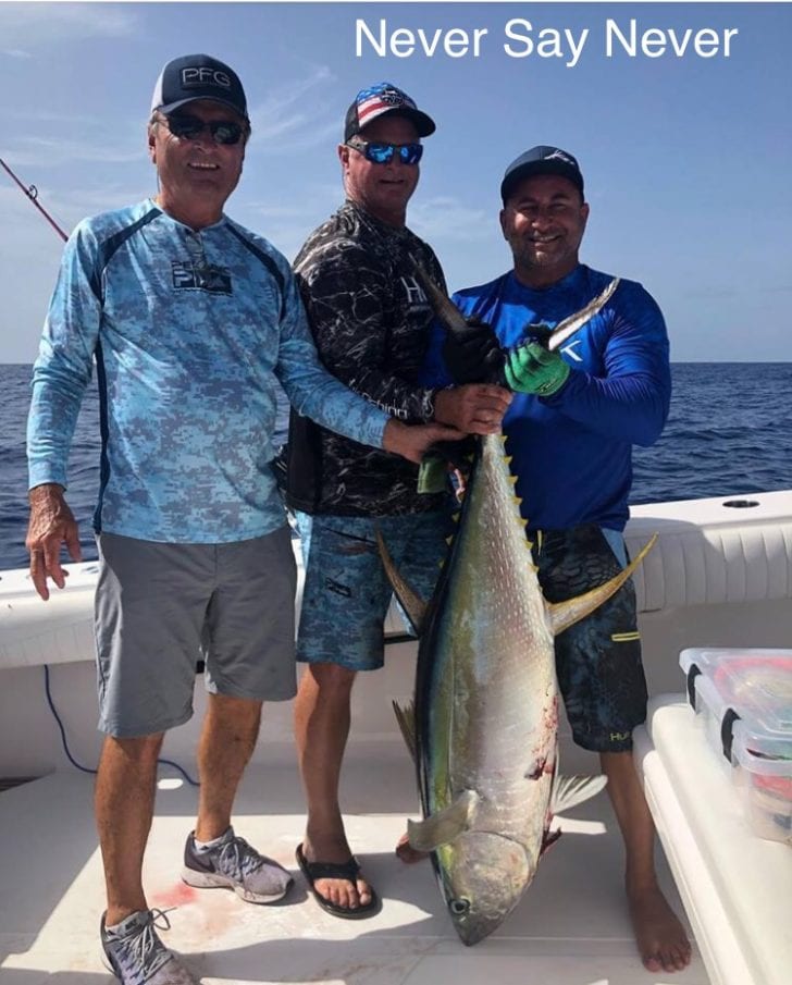 Team Never Say Never with owner captain Jim A on his 41 Bahama found some  nice yellow fin tuna off Elbow Cay. Pictured Don, Darin, Jim A, Photo  courtesy of John from