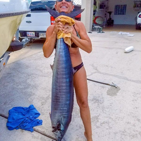 Jim and Leah Pisarski caught this 4 foot 7 inch wahoo off Boynton inlet on Friday the 13th 2018. One day after their 32nd wedding anniversary