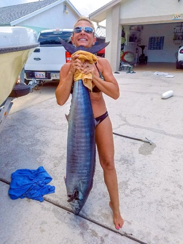 Jim and Leah Pisarski caught this 4 foot 7 inch wahoo off Boynton inlet on Friday the 13th 2018. One day after their 32nd wedding anniversary