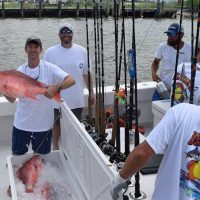 Team Deliverance showing off heir catch of Red Snapper at the Alabama Deep Sea Fishing Rodeo.