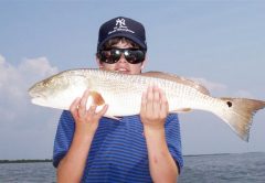 12 yr. old Jason Dengle from Texas caught his first homosassa redfish while out w Capt. Rick.