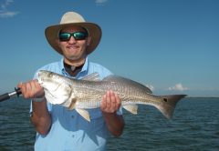 Jacob gets a top-slot redfish using chunk mullet strategically placed on the end of a sandbar which was covered up in live mullet!
