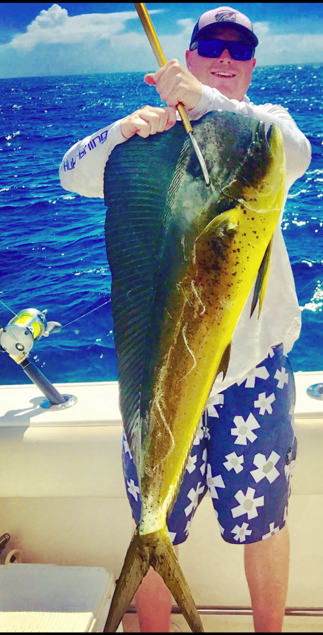 Billy West shows off a beautiful mahi-mahi he caught in the Gulf.