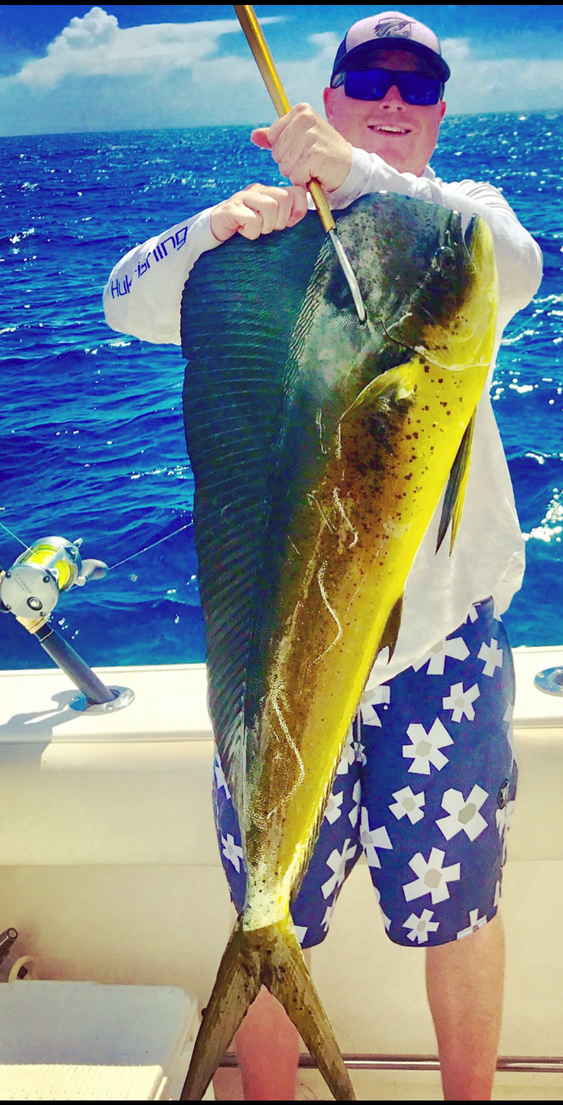 Billy West shows off a beautiful mahimahi he caught in the Gulf. Coastal Angler & The Angler