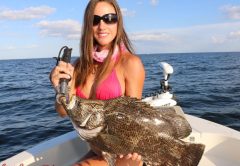 Luiza shows off a nice Tripletail. Learn more about this amazing lady angler: www.fishingwithluiza.com