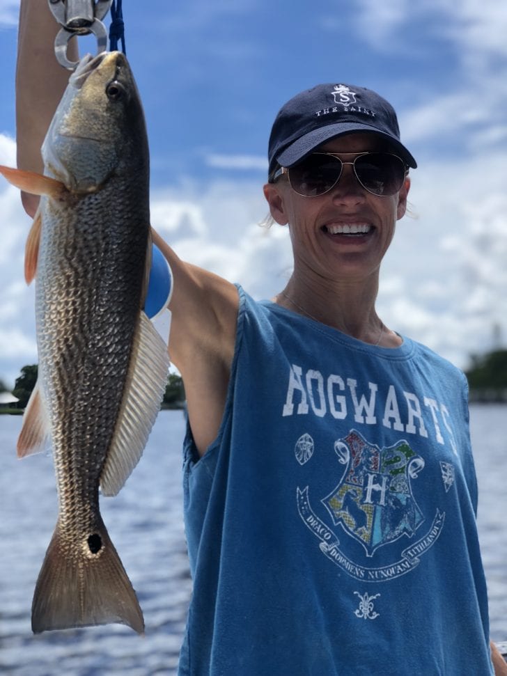 Lynn with a redfish.