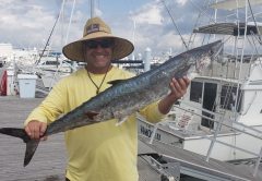 Bill Johnson with his kingfish dinner.