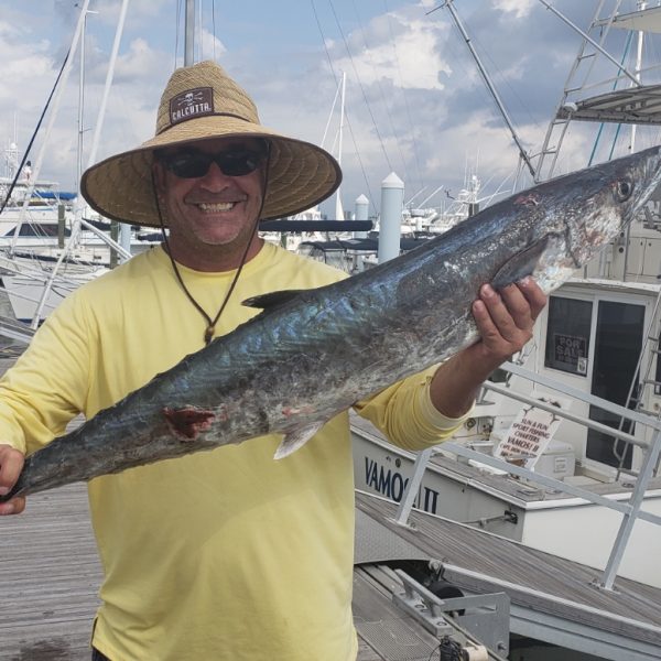 Bill Johnson with his kingfish dinner.