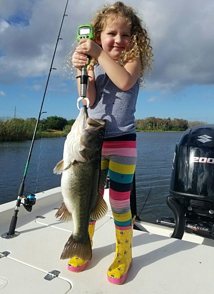 Scout with a 6.4 largemouth she caught New Year's Day