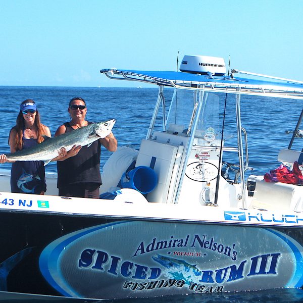 Billy and Sheri with her kingfish landed late on a Sunday afternoon