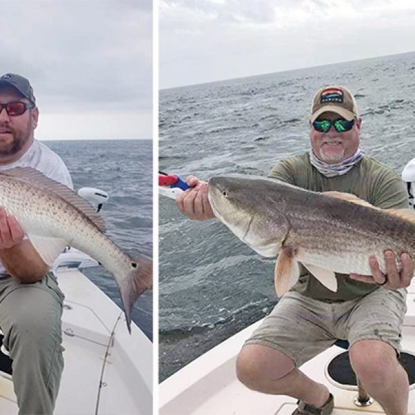 Scott King and Jon Mihalic from AL smashing bull reds aboard the C-note boat.