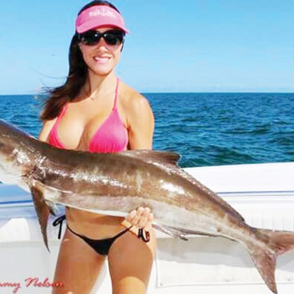 Luiza shows off a beautiful cobia. Catch more about this amazing lady angler at: www.fishingwithluiza.com