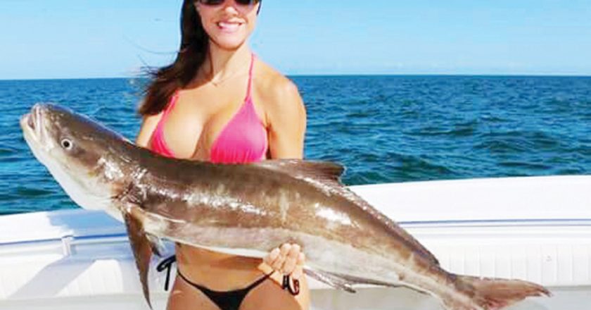 Luiza shows off a beautiful cobia. Catch more about this amazing lady angler at: www.fishingwithluiza.com